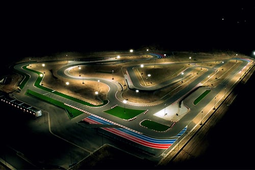 aerial shot of k1 circuit at night flooded with lights