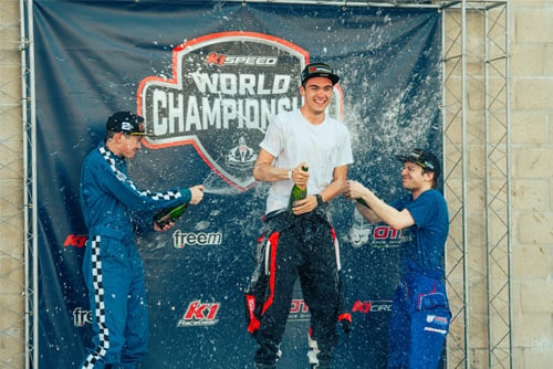 the 2024 world championship winners spray champagne on the podium