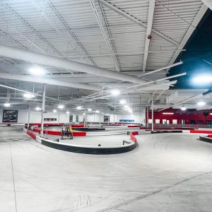 a wide-angle shot of the indoor kart track at k1 speed traverse city