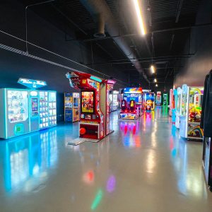 rows of video games and prize machines inside the arcade at k1 speed traverse city