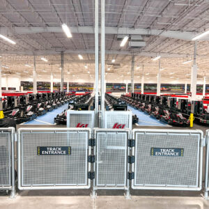 rows of state-of-the-art electric go-karts in the pits at K1 Speed in Knoxville